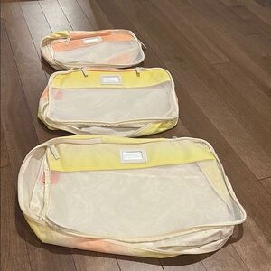 Calpak Packing Cubes Set in Yellow and Peach